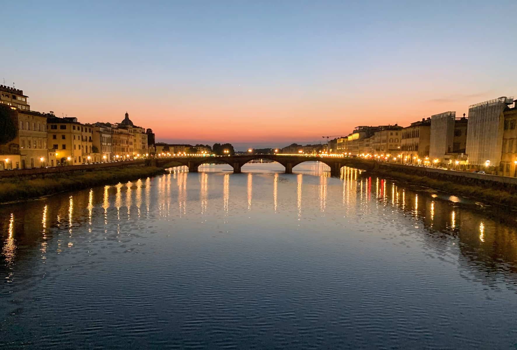 Florence Bridge Ponte Santa Trinita Sunset View Of Arno River Lights Reflected In Water