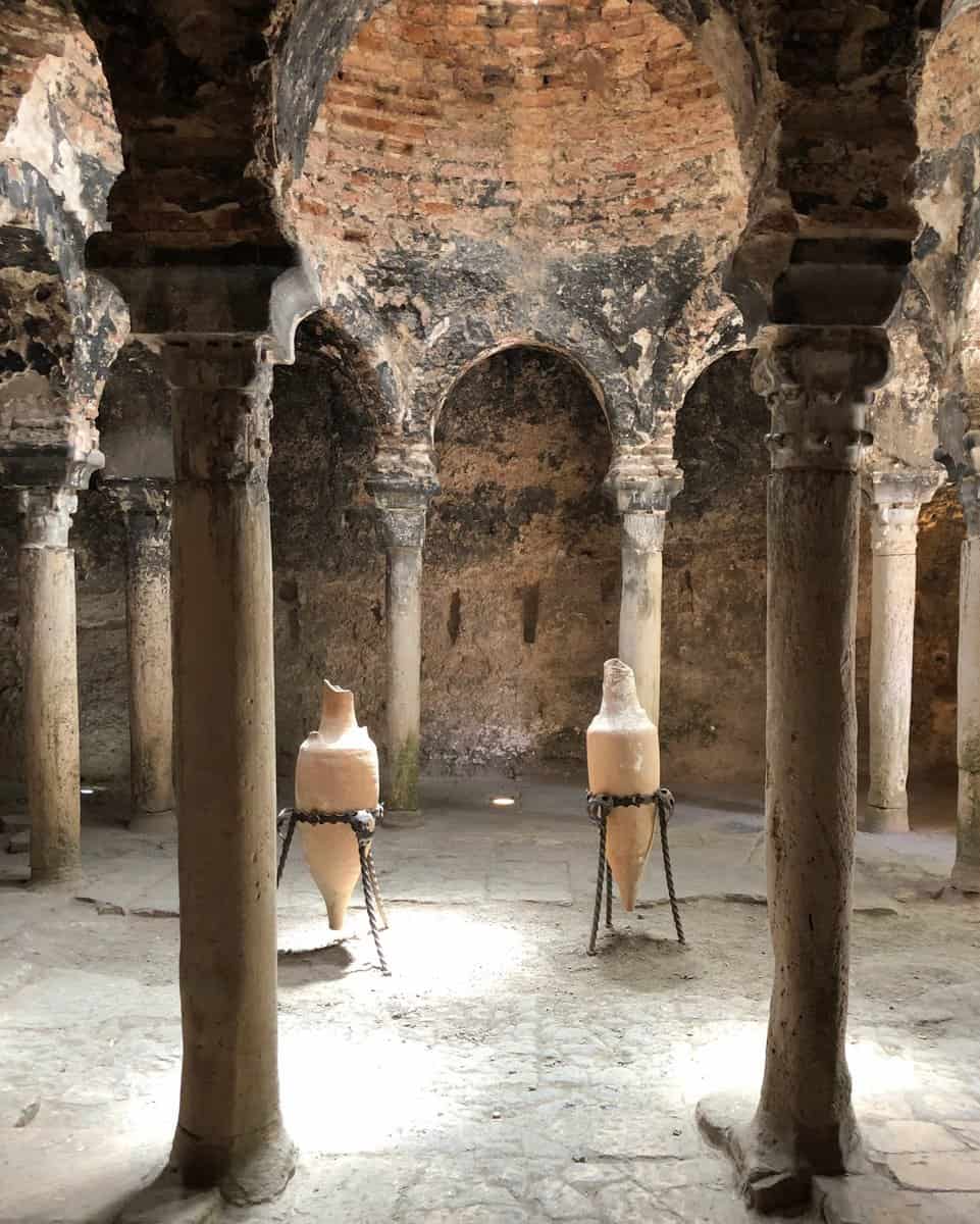 Palma De Mallorca Arab Baths Interior Stone Columns And Brick Ceiling With Two Ceramic Water Jugs Islamic Architecture