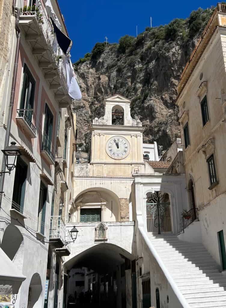 Atrani Amalfi Coast Town Square Stairs San Salvatore De Birecto Clocktower With Laundry And Mountain