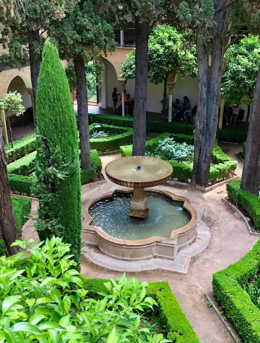 Granada Alhambra Courtyard Garden Nasrid Palace Round Fountain With Cedar Trees Boxwood Hedges View From Above