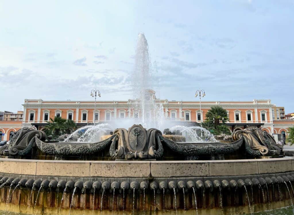 Bari Centrale Train Station Fountain Palm Trees Orange Buildings Puglia Italy