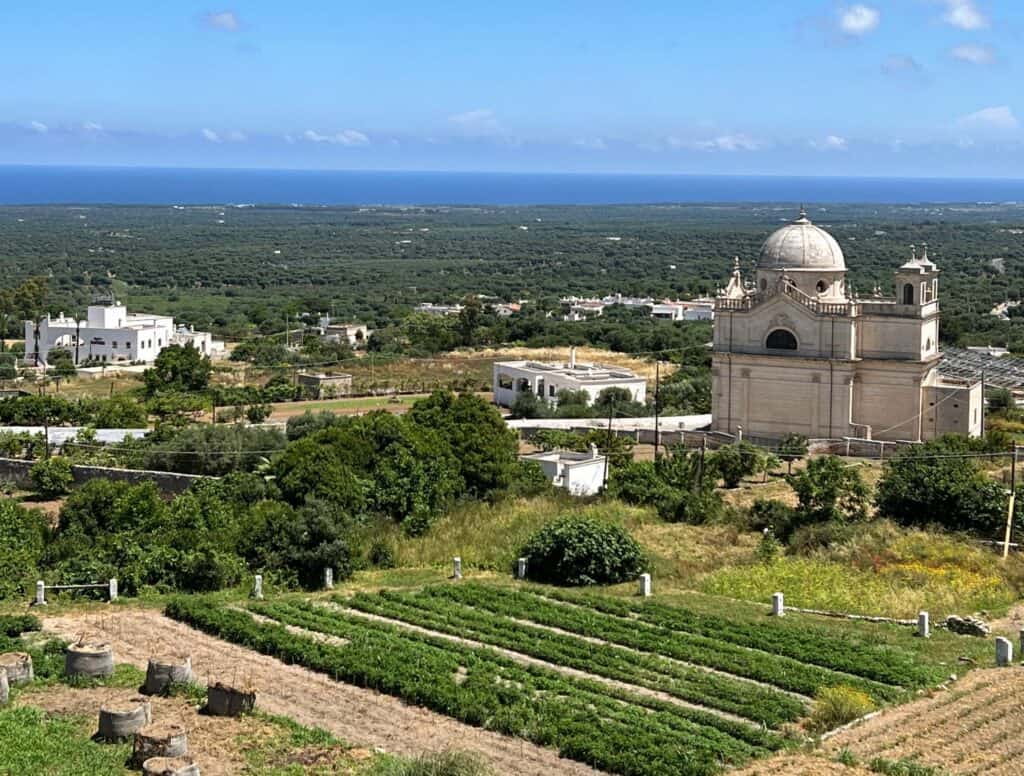 Val D Itria Puglia Italy View Of Farmland And Church From Ostuni White Buildings Coast In Distance