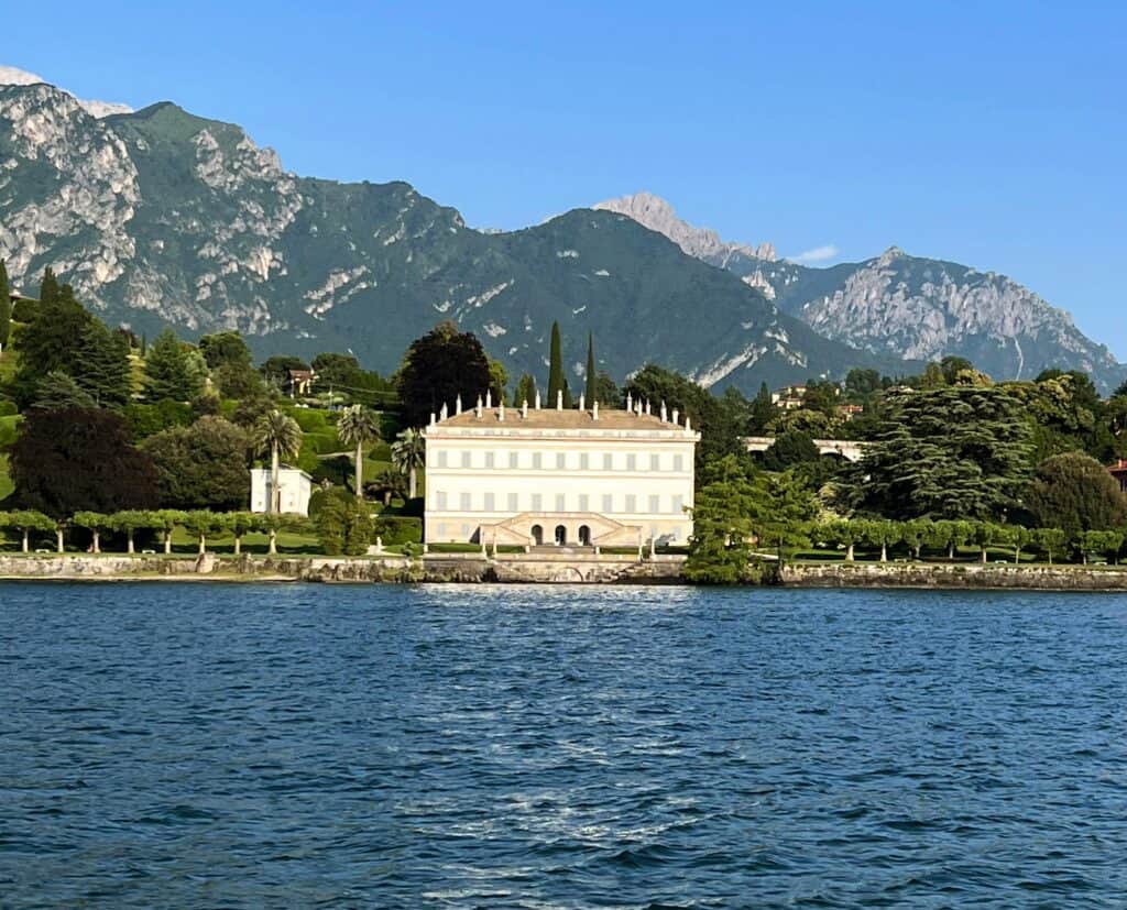 Lake Como View Of Villa Melzi From Ferry White Mansion Gardens And Mountains