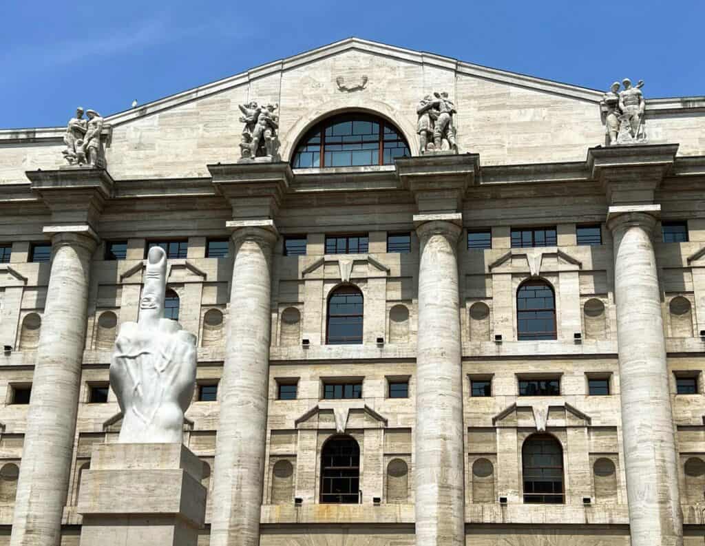 Milan Stock Exchange Building And LOVE Finger Statue By Maurizio Cattelan