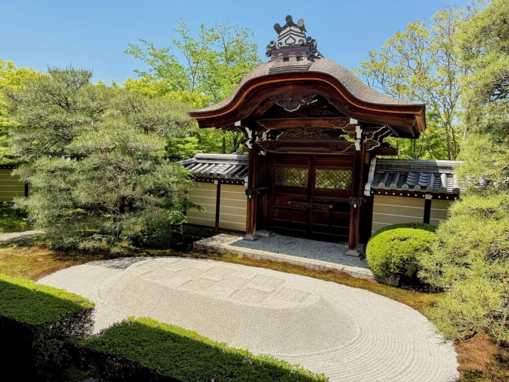 Eikando Temple Zen Garden With Dark Wood Roof And Patterned Sand Mound Kyoto Japan