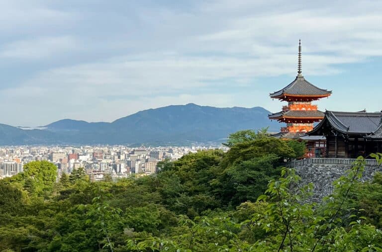 Kiyomizu-dera Temple View Of Roof And Green Maple Trees And Kyoto In Distance